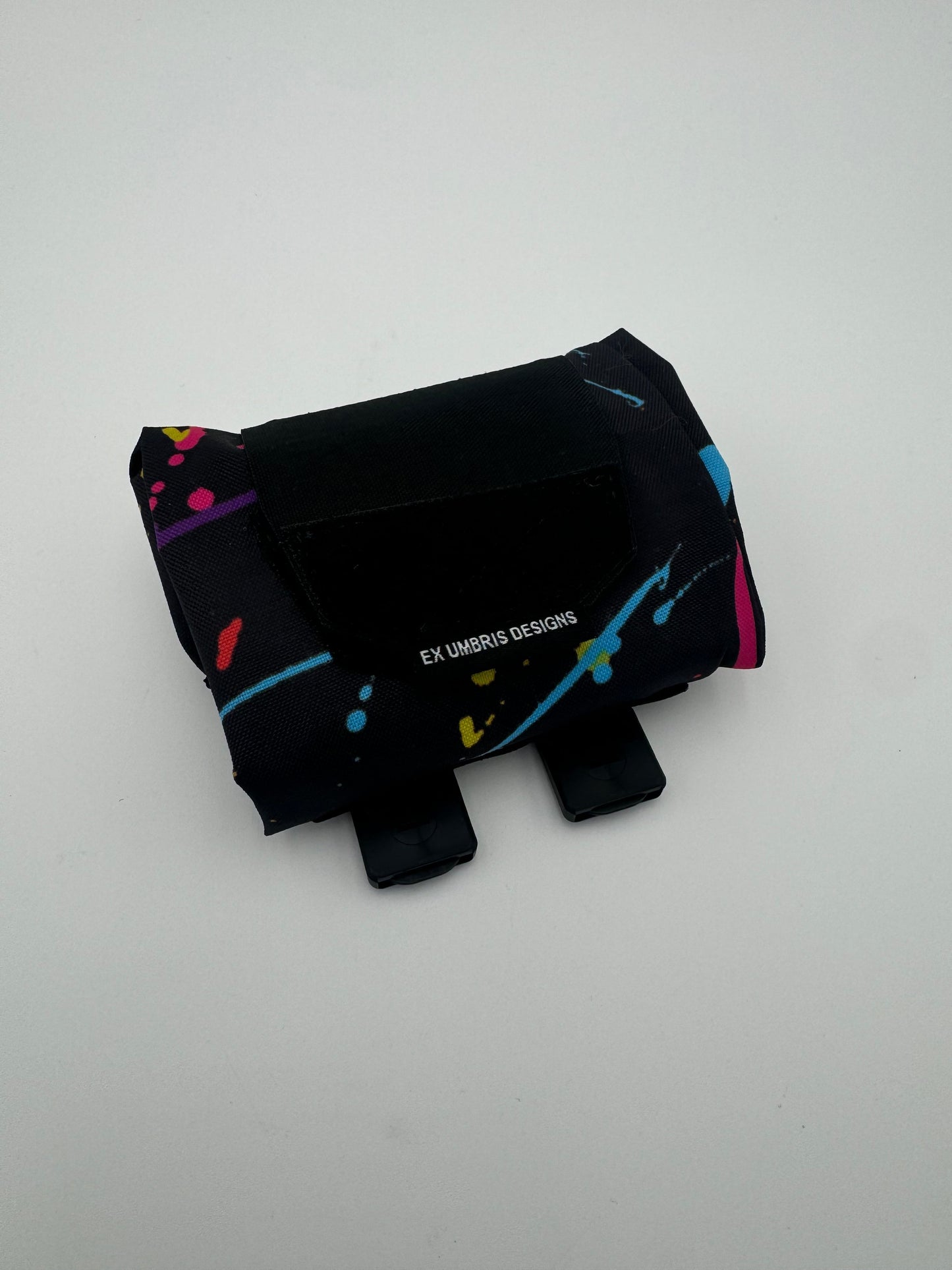TRI-FOLD DUMP POUCH